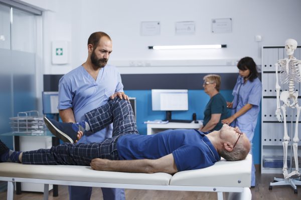 Podiatrist doctor treating patient